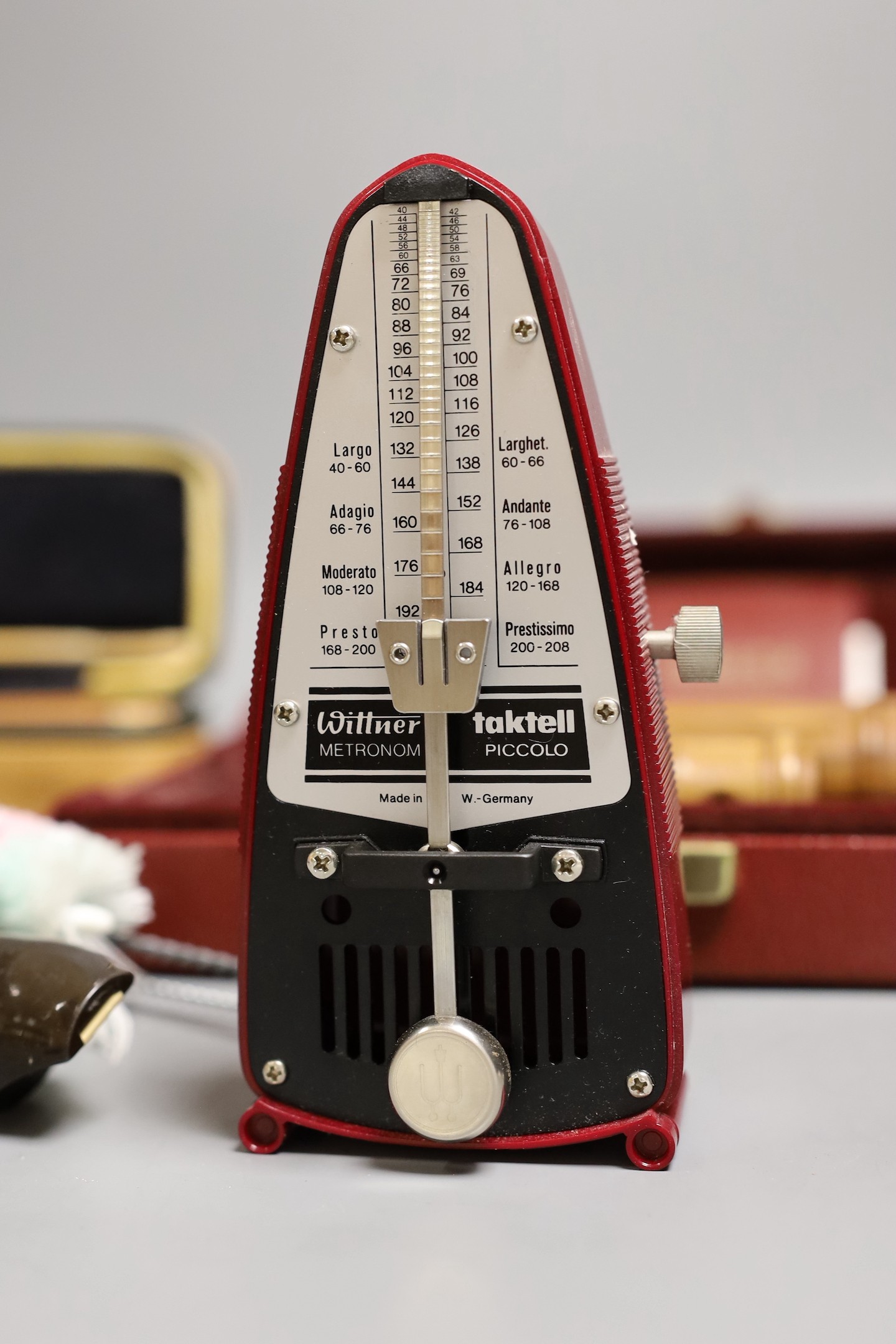 Two cased recorders, one other and a metronome etc